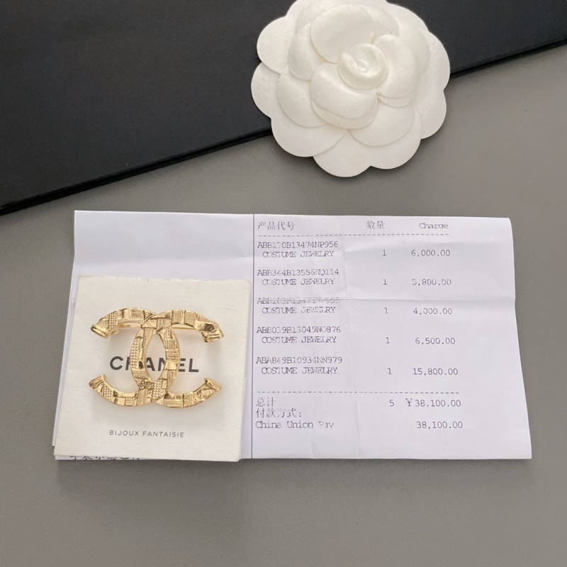 Ch**el brooches